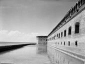 Exterior view showing Ft. Jefferson's moat, wall, and bastion on Garden Key in the Dry Tortugas.