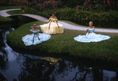 View showing Southern Belles in vintage dresses at the Cypress Gardens theme park in Winter Haven, Florida.