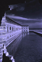 Exterior view showing Ft. Jefferson's moat, wall, and bastion on Garden Key in the Dry Tortugas.