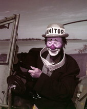 Close-up portrait of Ringling Circus clown Paul Jerome sitting in a jeep at the beach.