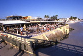 Looking east at outdoor dining area of the Times Square Restaurant in Fort Myers Beach.