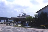 Boat in yard for maintenance and repairs at Dunn's Creek Fish Camp on Heckscher Dr. in Jacksonville.