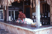 Bartender at the Crustacean's restaurant outdoor bar in Jacksonville Beach.