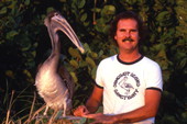 Zoologist Ralph T. Heath with rescued pelican at the Suncoast Bird Sanctuary in Indian Shores.