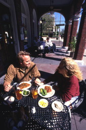 Couple having lunch outside Cafe Creole at the historic Cherokee Club in Ybor City.