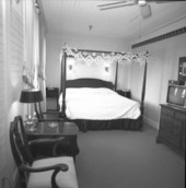 Bedroom at the Gibson Inn located at 51 Ave. C in Apalachicola, Florida.