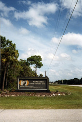 Koreshan State Historic Site sign in Estero, Florida.