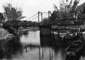 Swing bridge over Estero River.
