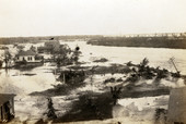 Bird's eye view looking over a section of Everglades City along the Barron River following the 1926 hurricane.