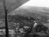 Aerial view looking west over the Koreshan Unity property along the Estero River.