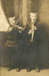 Postcard showing two unidentified young Koreshan Unity musicians in Estero, Florida.
