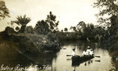 Postcard showing Koreshans in a rowboat on the Estero River.