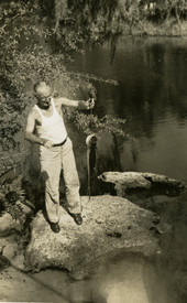 Koreshan with small tarpon caught in the Estero River.