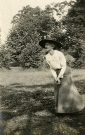 Koreshan Annie Ray Andrews catching a baseball.