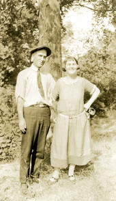 Outdoor portrait of George Switzer and daughter Bessie.