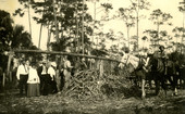 Koreshans Virginia and Allen Andrews with others at the sugar cane grinding area.