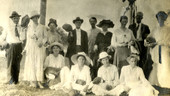 Group portrait of Koreshans with coconuts.
