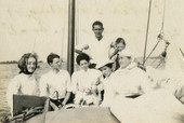 Annie Ray Andrews, left, with fellow Koreshans aboard their boat.