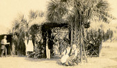 Postcard showing Koreshans at their fair exhibition in Estero, Florida.