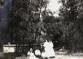 Annie Ray Andrews, seated left, with small group of Koreshan ladies at Bamboo Landing in Estero, Florida.