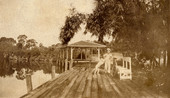 Koreshan boy with dog at Bamboo Landing in Estero, Florida.