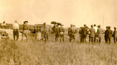 Koreshan men in field.