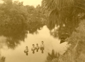 Koreshan boys swimming in the Estero River.