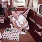 Koreshan Unity president Hedwig Michel with present on Christmas day.