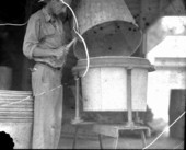 Assembling galvanized iron barrels