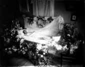 Woman laid in a coffin in her home