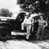 Nels Falk and Jack Woodward in front of fire truck - Pinetta, Florida