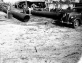 Workers with smokestacks at Page sawmill - Greenville, Florida