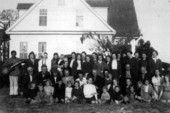 Congregation gathered for portrait outside Cherry Lake Farms baptist church - Cherry Lake, Florida