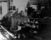 Inside view of tables and counter of sundries at Coggins' luncheonette - Madison County, Florida