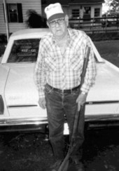 Mr. F.C. Cone holding a civil war rifle - Greenville, Florida