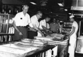 Millard Caldwell and others at a military base .