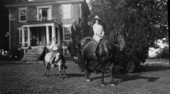 Mary Caldwell on a horse with unidentified boy - Richmond, Virginia