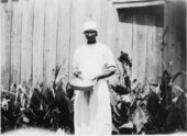 Farmworker near building - Richmond, Virginia
