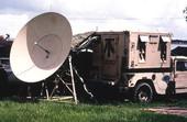 View of a truck and satellite dish in Dade County following Hurricane Andrew.
