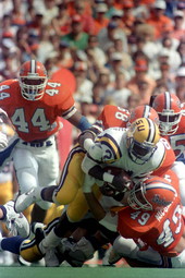 University of Florida players stops an LSU player - Gainesville, Florida