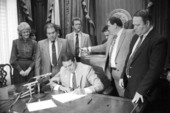 Governor Bob Martinez signs a foster care bill - Tallahassee, Florida