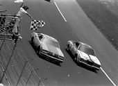 Dale Earnhardt (left) comes in second behind Neil Bonnett (21) in the Firecracker 400 at the Daytona International Speedway.