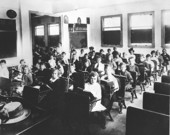 School children at their desks.