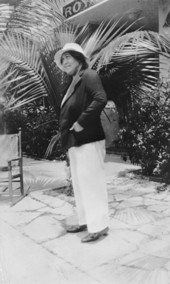 Rose Weiss in front of her apartment house, The Royal.