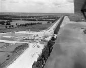Aerial view overlooking pumping station and hydraulic gate in the CSF Flood Control District near Lake Okeechobee.