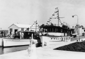 Close-up view showing boats in the lock at Moore Haven.