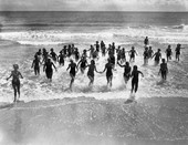 Young campers running on beach at the FERA camp for unemployed women - Anastasia Island, Florida