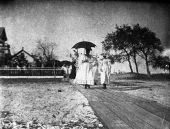 People walking on boardwalk - Apalachicola, Florida