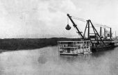 Dredge and laborer's houseboat in an Everglades canal - Florida