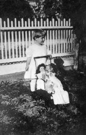 Louise Bomlay with carriage and dolls